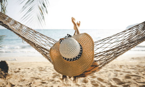 woman on a hammock because relaxation can be intuitive movement too