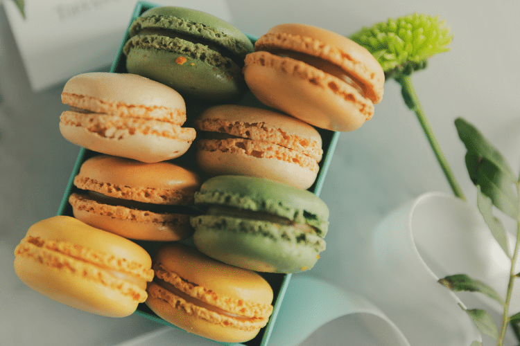 colorful macarons in a decorative box